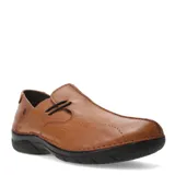 Zapato casual tipo mocasín de cuero negro, con costuras blancas visibles en contraste y un pequeño lazo decorativo en el empeine. Posee suela de goma negra y un diseño cómodo.