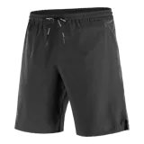 Short deportivo Salomon modelo Shakeout Core de 9 pulgadas, color negro, sin forro, con bolsillos laterales con cierre y detalles reflectantes de la marca.