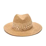 Sombrero de paja color beige con cinta tejida en blanco y marrón.