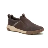 Zapatillas slip-on Caterpillar modelo Hex Ready, color marrón oscuro. Presentan un diseño moderno sin cordones con capellada de cuero nubuck, entresuela de EVA en tono beige y suela de goma con tecnología de tracción hexagonal.