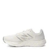 Championes New Balance 680 V8 para mujer, color beige con logo plateado.