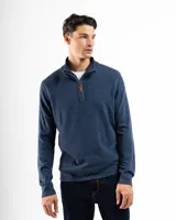 Buzo de tejido de punto negro, con cuello alto y cierre frontal parcial.