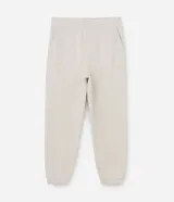 Pantalón jogger de algodón con felpa, color beige, con cintura elástica, cordón ajustable, bolsillos laterales y puños elásticos en los tobillos.