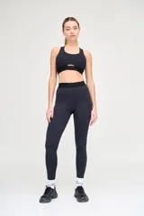 Calza larga de tiro alto color azul marino, con cintura elástica de 4cm con logo en bajo relieve.