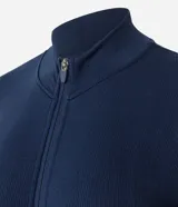 Campera deportiva Get Over de corte ajustado, color marrón, confeccionada en poliamida y elastano con textura acanalada, cuello alto y cierre frontal por cremallera.