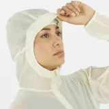 Campera cortavientos de mujer Salomon Sense Aero Wind, ultraligera y transpirable, color blanco semitransparente, con capucha y cierre frontal completo.