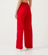 Pantalón wide leg rojo confeccionado en viscolino con cintura elástica y bolsillos laterales.