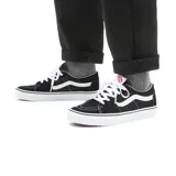 Championes Vans SK8 Low negros con detalles en blanco.