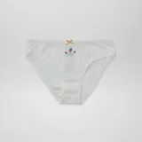 Pack de siete bombachas de algodón con diseños variados, incluyendo estampados de vaquitas de San Antonio, flores y colores lisos, todas con un pequeño lazo decorativo en la cintura.