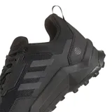 Championes Adidas Terrex AX4 Hiking de hombre, color negro. Diseñados para senderismo y actividades al aire libre, con suela de caucho Continental para un agarre óptimo en terrenos rocosos, mojados y sucios.