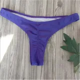 Bombacha de bikini colaless para mujer, de diseño plisado en la parte trasera y tiro bajo, disponible en varios colores.