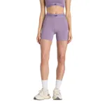 Short deportivo ajustado New Balance en color lila, con cintura elástica ancha estampada con líneas y el logo de la marca.
