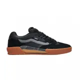 Championes Vans modelo Skate Ave 2.0, de diseño técnico con base negra y suela de goma color caramelo. Presentan una estructura combinada de gamuza y malla transpirable, con la icónica franja lateral de la marca en tono gris y tecnología UltimateWaffle en la suela.