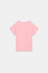 Camiseta de algodón con efecto lavado, cuello redondo y manga corta. Presenta un diseño con la palabra 'paris' formada por tachas metálicas.