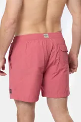 Short de baño negro liso, con cintura elástica y cordón regulable, dos bolsillos laterales y suspensor de malla fina.