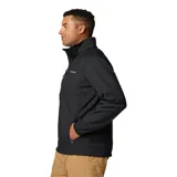 Chaqueta softshell negra con cierre frontal completo, cuello alto con protector de mentón, bolsillo vertical con cierre en el pecho y bolsillos laterales con cierre. Cuenta con puños ajustables y tecnología resistente al agua y al viento.