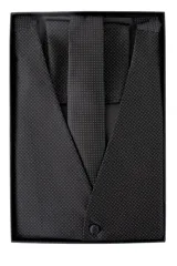 Set de chaleco, corbata y pañuelo negros con lunares blancos.