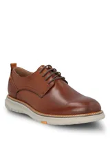 Zapato de cuero Hush Puppies modelo Rustic, color marrón tostado, con cordones y suela de EVA gris claro.