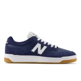Championes New Balance modelo NM480PRO, color azul marino con detalles en blanco y suela color caramelo.