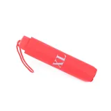 Paraguas manual color rojo con logo XL en blanco.