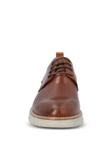 Zapato de cuero Hush Puppies modelo Rustic, color marrón tostado, con cordones y suela de EVA gris claro.
