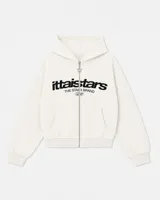 Buzo con cierre frontal tipo hoodie, color blanco crema, con estampado gráfico en el pecho y tirador de cierre en forma de estrella.