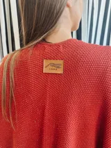 Ruana de algodón color ladrillo con lurex.