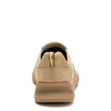 Zapatos Caterpillar Flexion Slip On de hombre, color beige, con diseño sin cordones, elásticos laterales para mayor comodidad, suela de goma estructurada y detalle de la marca en el lateral.