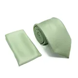 Set de corbata y pañuelo de bolsillo en color verde menta, con textura geométrica de pequeños cuadrados.