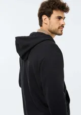 Campera canguro de plush azul marino con cierre frontal completo, capucha con cordón ajustable y bolsillos frontales estilo tipo canguro.