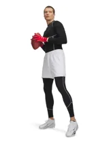 Calza deportiva larga Under Armour HeatGear Elite, color negro, con cintura elástica visible y paneles de malla en la entrepierna para mayor ventilación. Diseño ergonómico con costuras estratégicas para mayor durabilidad y libertad de movimiento.