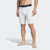 Short de compresión deportivo Adidas Techfit, color blanco con logo negro en la pierna izquierda y cintura elástica negra con la inscripción "Techfit" en blanco.