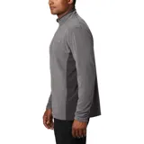 Buzo polar de media cremallera Columbia, confeccionado en tejido suave con protección solar UPF 50. Presenta cuello alto, mangas largas y paneles laterales en un tono de gris más oscuro.