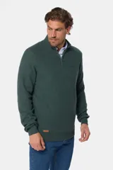 Buzo azul marino de algodón texturizado, con cuello alto y medio cierre con cremallera. Presenta un pequeño logo bordado en el pecho.