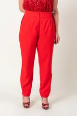 Pantalón fucsia de crepe con bolsillos laterales con detalle de paillettes.