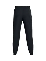 Joggers deportivos Under Armour modelo Unstoppable, confeccionados en tejido técnico elástico con tecnología UA Storm repelente al agua. Presentan corte ajustado en las piernas, cintura elástica con cordón interno, bragueta funcional con cierre a presión, bolsillos laterales y bolsillo trasero con cremallera sellada.
