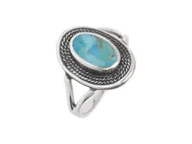 Anillo de plata 925 con piedra turquesa ovalada.