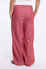 Pantalón palazzo de tiro alto con estampado a rayas verticales rosas y blancas, con cintura elástica ajustable con cordón.