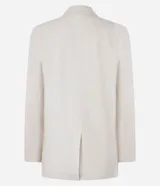 Blazer celeste de viscosa y lino, con cuello inglés, cierre de un botón y solapas.