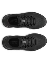 Championes de running Under Armour modelo Charged Surge 4, color negro con diseño de malla transpirable y suela con amortiguación Charged Cushioning.