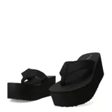 Sandalias de plataforma alta tipo flip-flop, de color negro, con base gruesa y ligera de estilo retro.