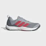 Championes de entrenamiento Adidas Rapidmove 2, color gris con las tres tiras laterales en rojo. Cuentan con una parte superior de malla elástica transpirable, amortiguación Lightstrike en la entresuela y suela de caucho Continental™ para mayor tracción.