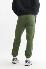 Pantalón de jogging verde militar de felpa, con cintura elástica y puños ajustados.
