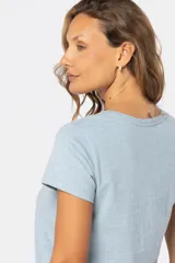 Remera de manga corta y cuello redondo, color verde menta jaspeado.