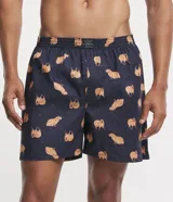 Calzoncillo tipo bóxer de tela color azul marino, con estampado de carpinchos en tonos marrones y puntos blancos. Tiene cintura elástica con la marca "Viko" en el centro.