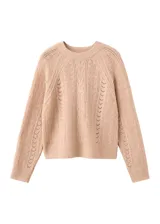 Sweater de punto color tostado, de cuello redondo y mangas largas con diseño texturizado de ochos y detalles calados.