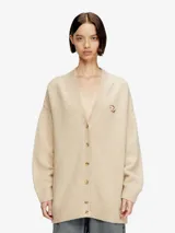 Cardigan de punto grueso Diesel M-Areela, color beige melange, de calce relajado, escote en V, cierre frontal con botones, hombros caídos y detalle calado bordado con el logo Oval D en el pecho.