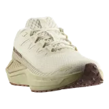 Championes Salomon DRX Defy Grvl de running y trail, en color beige y tostado, diseñados con tejido de malla transpirable, tecnología Active Chassis y suela con tacos para mayor tracción en superficies mixtas.
