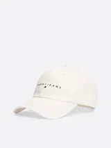Gorra de béisbol blanca de algodón con logo de Tommy Jeans bordado en el frente.