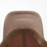 Gorra de béisbol color beige con bordado frontal con la frase 'Creative Club'.